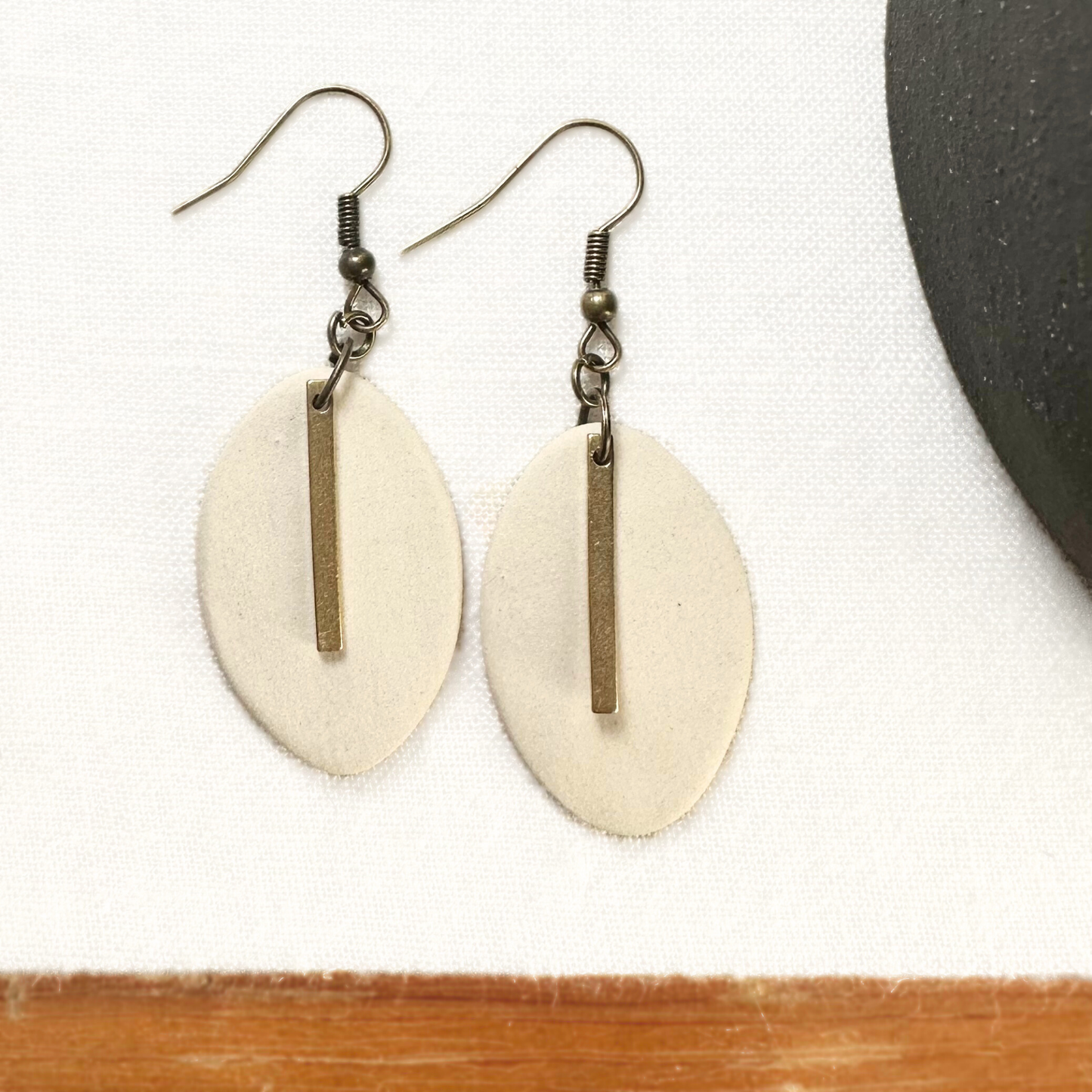 White Oval Ceramic Earrings (Gold Charmed)