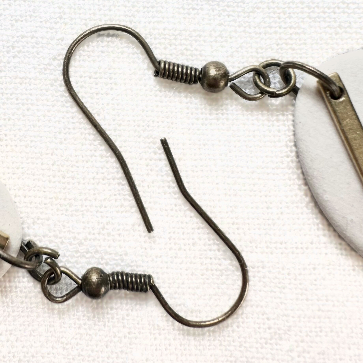 White Oval Ceramic Earrings (Gold Charmed)