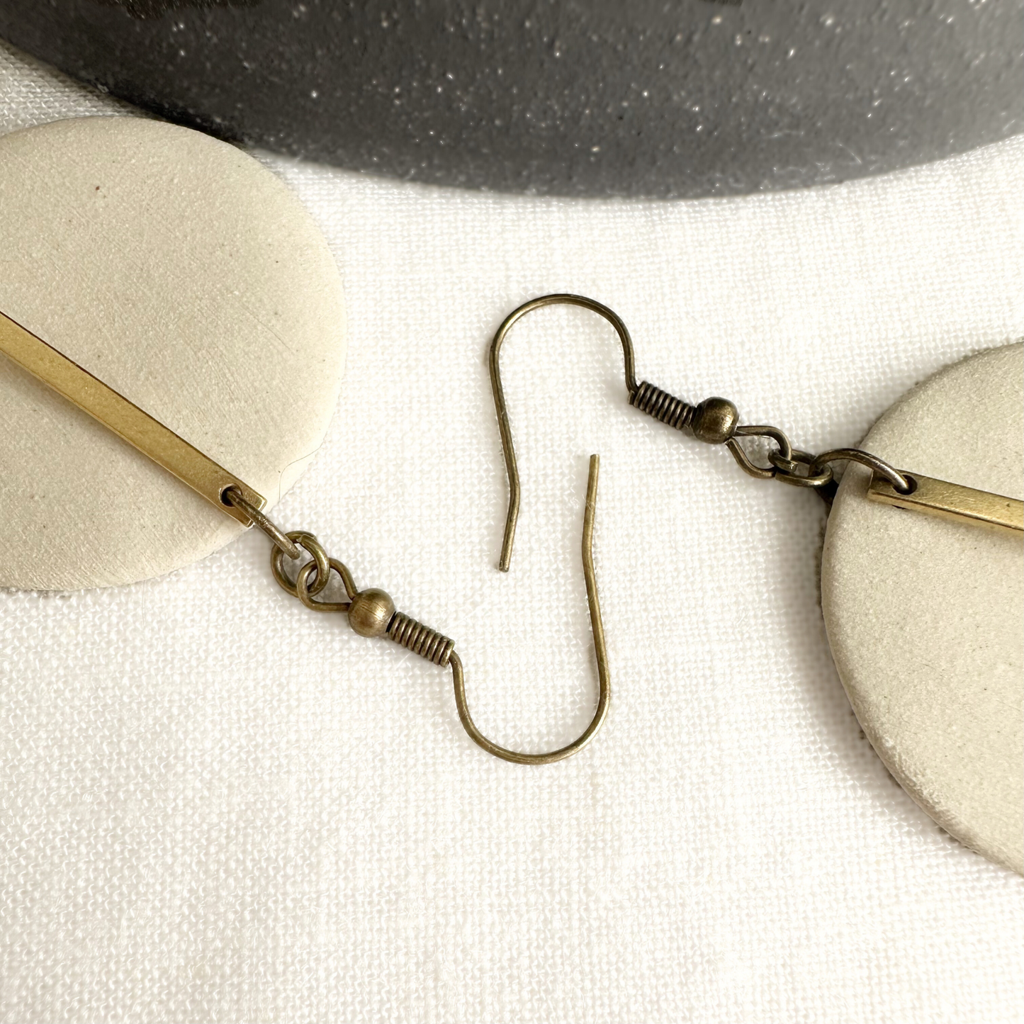 White Round Ceramic Earrings (Gold Charmed)