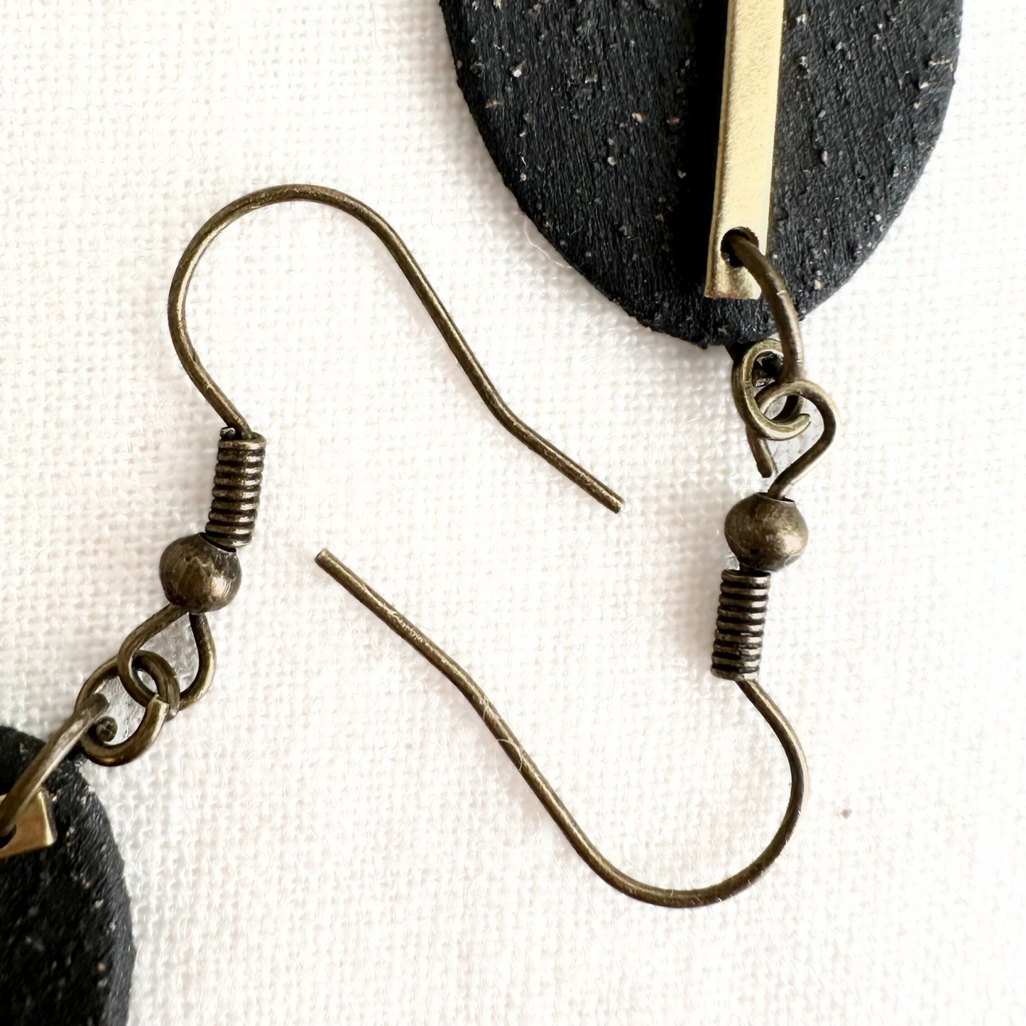 Handmade Ceramic Earrings (Black, Oval, Gold Charmed)
