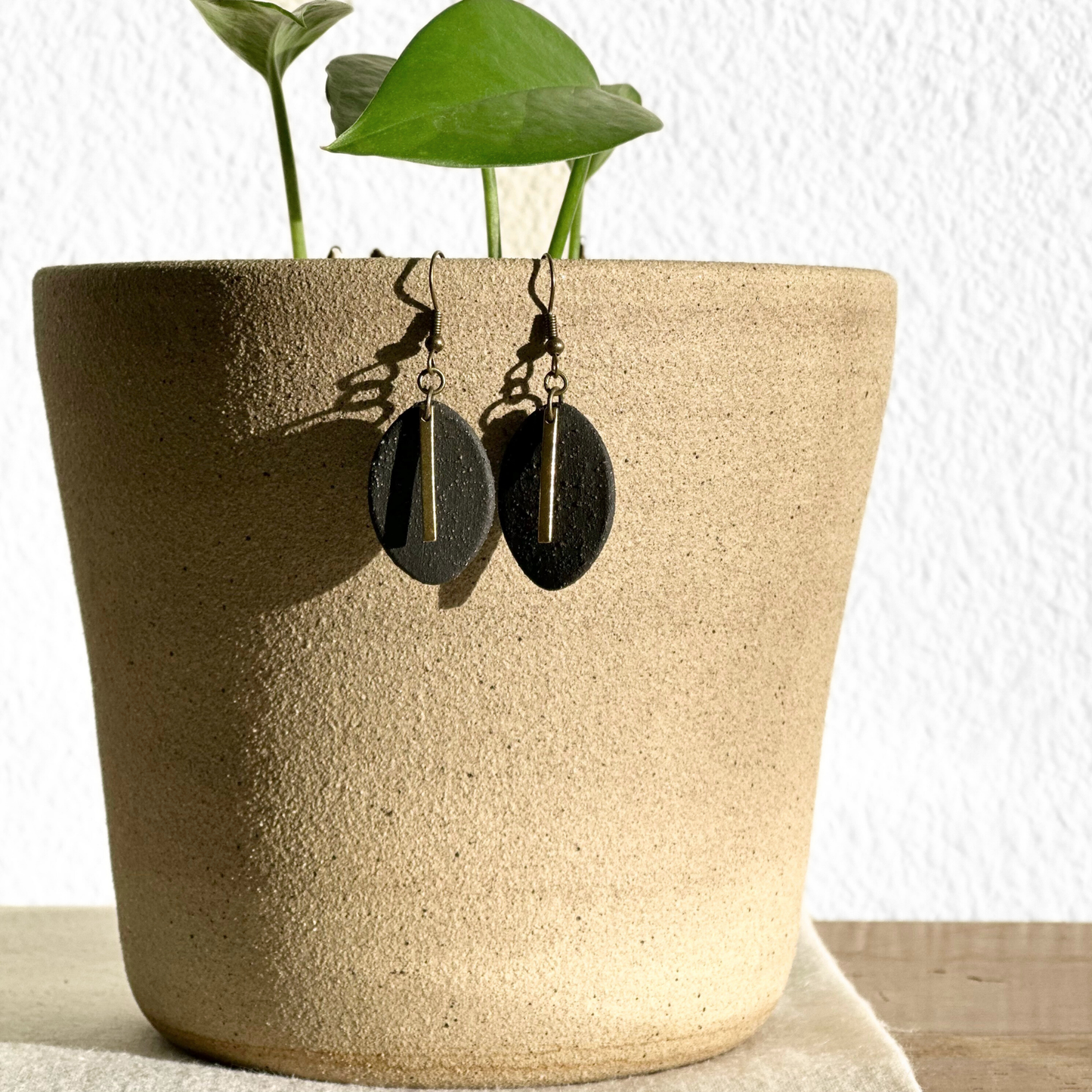Handmade Ceramic Earrings (Black, Oval, Gold Charmed)